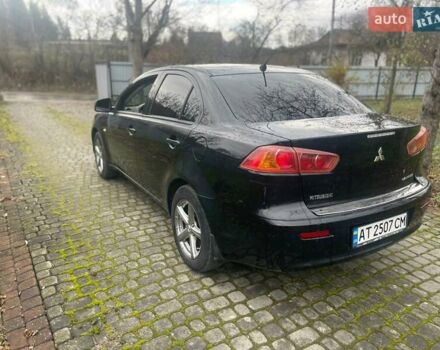 Черный Мицубиси Лансер, объемом двигателя 1.5 л и пробегом 270 тыс. км за 4999 $, фото 9 на Automoto.ua