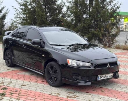 Черный Мицубиси Лансер, объемом двигателя 2 л и пробегом 217 тыс. км за 5500 $, фото 2 на Automoto.ua