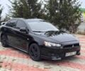 Черный Мицубиси Лансер, объемом двигателя 2 л и пробегом 217 тыс. км за 5500 $, фото 2 на Automoto.ua