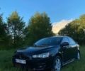 Черный Мицубиси Лансер, объемом двигателя 2 л и пробегом 290 тыс. км за 6000 $, фото 1 на Automoto.ua