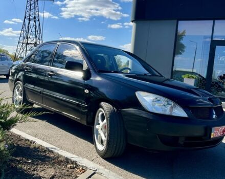 Чорний Міцубісі Lancer, об'ємом двигуна 1.6 л та пробігом 228 тис. км за 3499 $, фото 1 на Automoto.ua