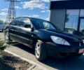 Чорний Міцубісі Lancer, об'ємом двигуна 1.6 л та пробігом 228 тис. км за 3499 $, фото 1 на Automoto.ua