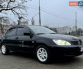 Чорний Міцубісі Lancer, об'ємом двигуна 1.6 л та пробігом 303 тис. км за 4350 $, фото 12 на Automoto.ua