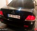 Черный Мицубиси Лансер, объемом двигателя 1.6 л и пробегом 180 тыс. км за 4000 $, фото 1 на Automoto.ua