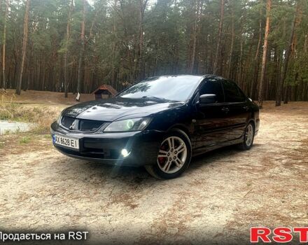 Чорний Міцубісі Lancer, об'ємом двигуна 2 л та пробігом 1 тис. км за 6100 $, фото 1 на Automoto.ua