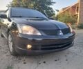 Чорний Міцубісі Lancer, об'ємом двигуна 1.6 л та пробігом 380 тис. км за 3799 $, фото 1 на Automoto.ua