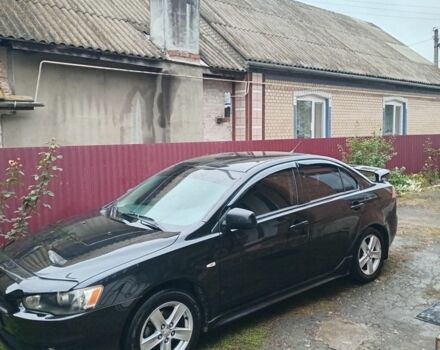 Чорний Міцубісі Lancer, об'ємом двигуна 2 л та пробігом 273 тис. км за 7100 $, фото 2 на Automoto.ua