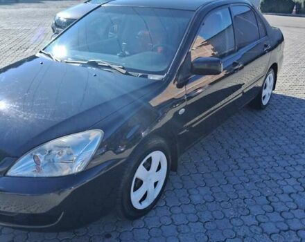 Міцубісі Lancer 2007 у Чернівцях на Automoto.ua Чорний Міцубісі Lancer, об'ємом двигуна 1.58 л та пробігом 247 тис. км за 4300 $, фото 8 на Automoto.ua