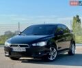 Чорний Міцубісі Lancer, об'ємом двигуна 2 л та пробігом 260 тис. км за 6000 $, фото 1 на Automoto.ua