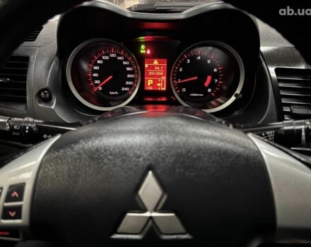 Черный Мицубиси Лансер, объемом двигателя 0 л и пробегом 201 тыс. км за 6900 $, фото 2 на Automoto.ua