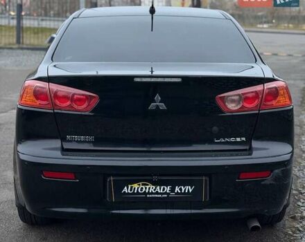 Черный Мицубиси Лансер, объемом двигателя 1.5 л и пробегом 245 тыс. км за 4499 $, фото 4 на Automoto.ua