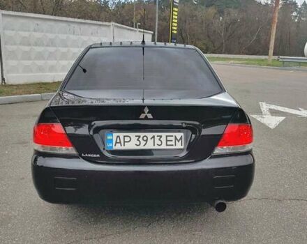 Чорний Міцубісі Lancer, об'ємом двигуна 1.58 л та пробігом 190 тис. км за 3750 $, фото 5 на Automoto.ua