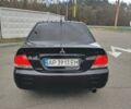Чорний Міцубісі Lancer, об'ємом двигуна 1.58 л та пробігом 190 тис. км за 3750 $, фото 5 на Automoto.ua
