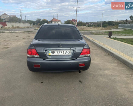 Чорний Міцубісі Lancer, об'ємом двигуна 1.6 л та пробігом 162 тис. км за 4650 $, фото 3 на Automoto.ua