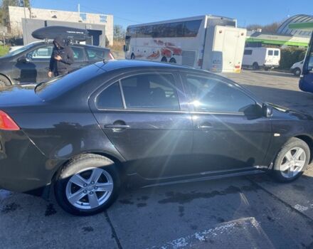 Черный Мицубиси Лансер, объемом двигателя 2 л и пробегом 372 тыс. км за 6200 $, фото 7 на Automoto.ua