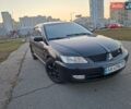 Чорний Міцубісі Lancer, об'ємом двигуна 1.58 л та пробігом 339 тис. км за 4400 $, фото 1 на Automoto.ua