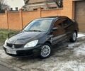 Чорний Міцубісі Lancer, об'ємом двигуна 1.6 л та пробігом 167 тис. км за 4500 $, фото 1 на Automoto.ua