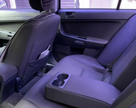 Чорний Міцубісі Lancer, об'ємом двигуна 2 л та пробігом 175 тис. км за 6500 $, фото 18 на Automoto.ua