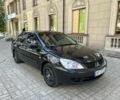 Черный Мицубиси Лансер, объемом двигателя 1.6 л и пробегом 230 тыс. км за 3650 $, фото 1 на Automoto.ua