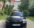 Чорний Міцубісі Lancer, об'ємом двигуна 2 л та пробігом 271 тис. км за 5700 $, фото 1 на Automoto.ua