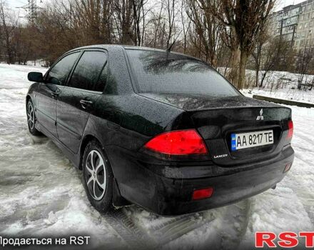 Чорний Міцубісі Lancer, об'ємом двигуна 1.6 л та пробігом 198 тис. км за 5600 $, фото 3 на Automoto.ua