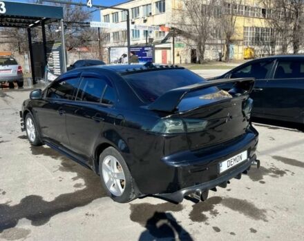 Чорний Міцубісі Lancer, об'ємом двигуна 2 л та пробігом 226 тис. км за 6700 $, фото 2 на Automoto.ua