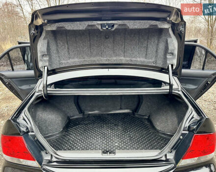 Черный Мицубиси Лансер, объемом двигателя 1.6 л и пробегом 216 тыс. км за 4990 $, фото 21 на Automoto.ua