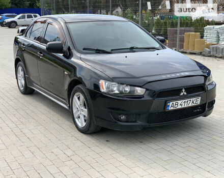 Чорний Міцубісі Lancer, об'ємом двигуна 2 л та пробігом 213 тис. км за 5250 $, фото 1 на Automoto.ua