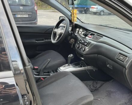 Чорний Міцубісі Lancer, об'ємом двигуна 1.6 л та пробігом 250 тис. км за 4800 $, фото 6 на Automoto.ua