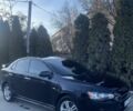 Черный Мицубиси Лансер, объемом двигателя 2 л и пробегом 390 тыс. км за 4499 $, фото 1 на Automoto.ua
