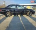 Чорний Міцубісі Lancer, об'ємом двигуна 1.59 л та пробігом 180 тис. км за 4999 $, фото 5 на Automoto.ua