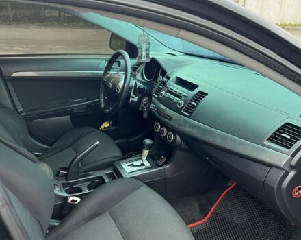 Черный Мицубиси Лансер, объемом двигателя 2 л и пробегом 350 тыс. км за 6700 $, фото 13 на Automoto.ua