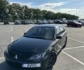 Черный Мицубиси Лансер, объемом двигателя 2 л и пробегом 244 тыс. км за 4496 $, фото 1 на Automoto.ua