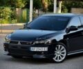 Чорний Міцубісі Lancer, об'ємом двигуна 2 л та пробігом 203 тис. км за 6900 $, фото 1 на Automoto.ua