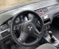 Чорний Міцубісі Lancer, об'ємом двигуна 1.58 л та пробігом 231 тис. км за 4300 $, фото 2 на Automoto.ua