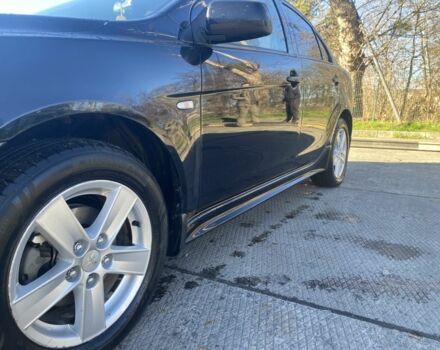 Черный Мицубиси Лансер, объемом двигателя 2 л и пробегом 372 тыс. км за 6200 $, фото 9 на Automoto.ua