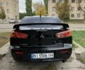 Черный Мицубиси Лансер, объемом двигателя 2 л и пробегом 180 тыс. км за 6100 $, фото 5 на Automoto.ua