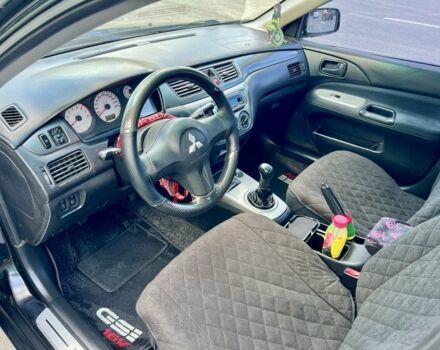 Чорний Міцубісі Lancer, об'ємом двигуна 1.6 л та пробігом 228 тис. км за 3499 $, фото 3 на Automoto.ua