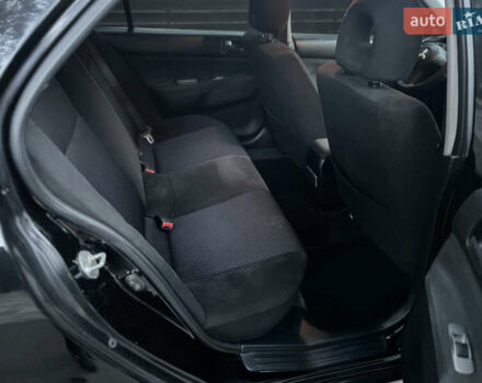 Черный Мицубиси Лансер, объемом двигателя 1.58 л и пробегом 278 тыс. км за 4800 $, фото 7 на Automoto.ua