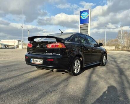 Черный Мицубиси Лансер, объемом двигателя 2 л и пробегом 224 тыс. км за 7000 $, фото 10 на Automoto.ua