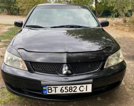 Чорний Міцубісі Lancer, об'ємом двигуна 1.6 л та пробігом 232 тис. км за 4200 $, фото 1 на Automoto.ua