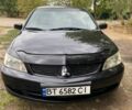 Чорний Міцубісі Lancer, об'ємом двигуна 1.6 л та пробігом 232 тис. км за 4200 $, фото 1 на Automoto.ua