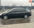 Чорний Міцубісі Lancer, об'ємом двигуна 1.6 л та пробігом 270 тис. км за 4500 $, фото 1 на Automoto.ua