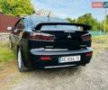 Чорний Міцубісі Lancer, об'ємом двигуна 2 л та пробігом 284 тис. км за 6200 $, фото 9 на Automoto.ua