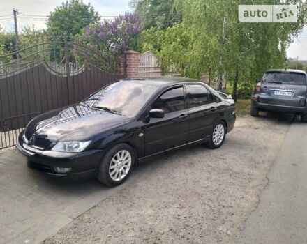 Чорний Міцубісі Lancer, об'ємом двигуна 0 л та пробігом 123 тис. км за 5200 $, фото 3 на Automoto.ua