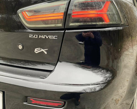 Черный Мицубиси Лансер, объемом двигателя 2 л и пробегом 164 тыс. км за 8300 $, фото 15 на Automoto.ua