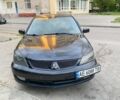 Чорний Міцубісі Lancer, об'ємом двигуна 1.58 л та пробігом 240 тис. км за 3400 $, фото 1 на Automoto.ua