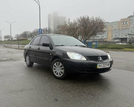 Чорний Міцубісі Lancer, об'ємом двигуна 1.58 л та пробігом 256 тис. км за 3700 $, фото 7 на Automoto.ua