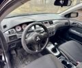 Чорний Міцубісі Lancer, об'ємом двигуна 1.6 л та пробігом 216 тис. км за 4990 $, фото 11 на Automoto.ua