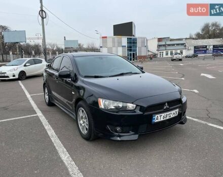Черный Мицубиси Лансер, объемом двигателя 2 л и пробегом 246 тыс. км за 7500 $, фото 8 на Automoto.ua